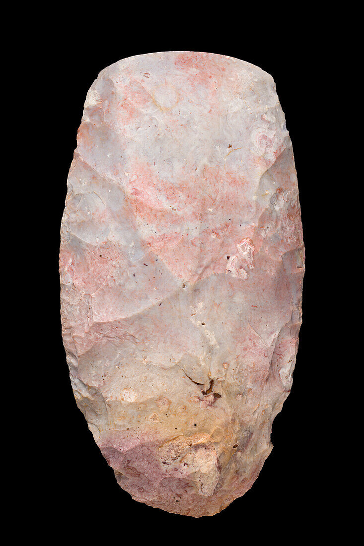 Neolithic ax cut in pink jasper