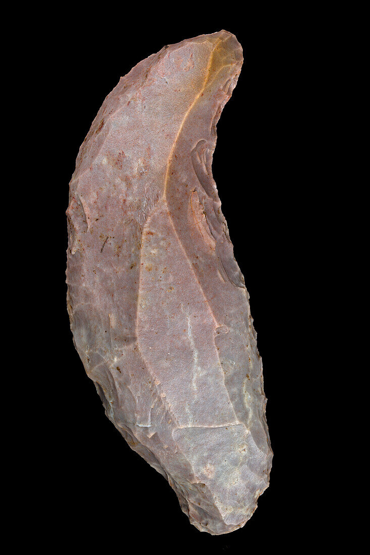 Neolithic curved scraper in pink jasper