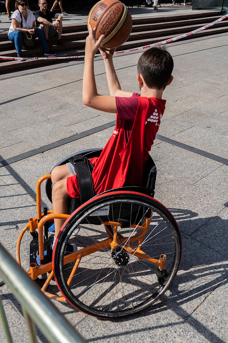 Boy playing wheelchair basketball, Zaragoza, Spain