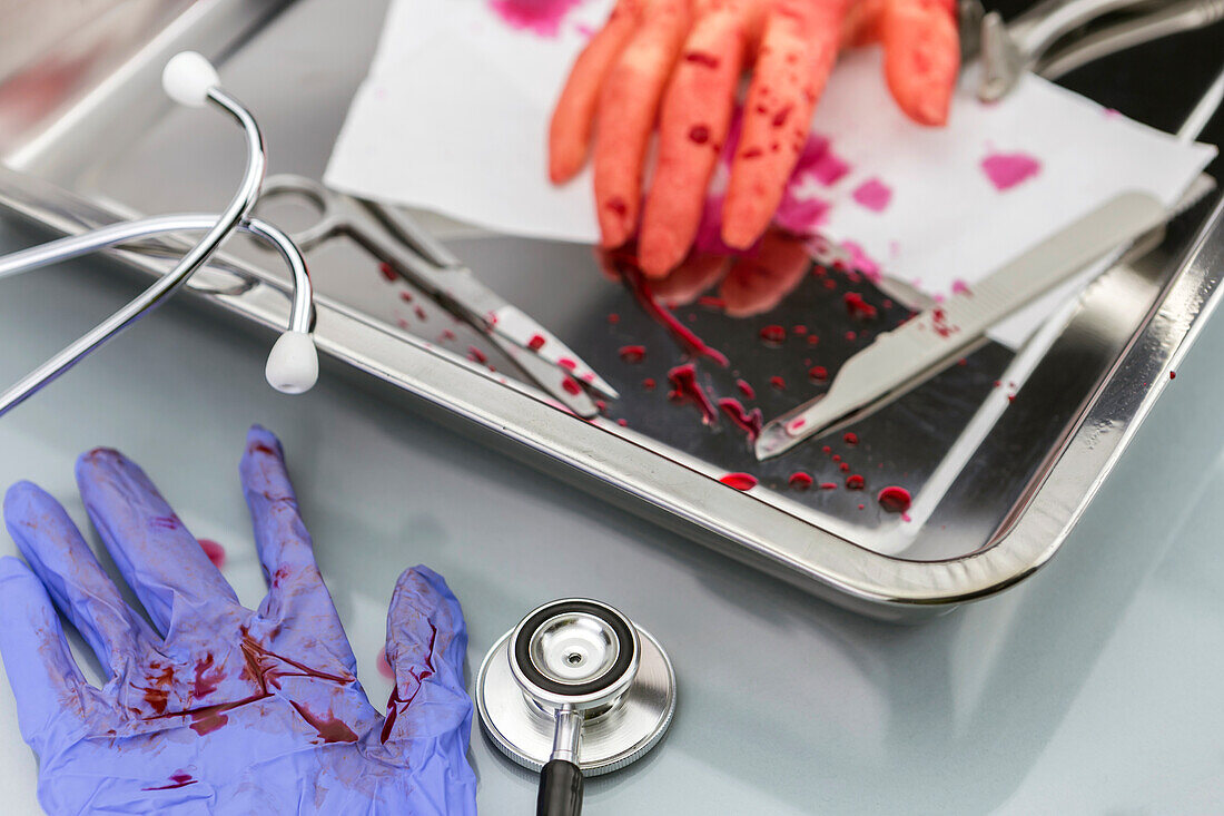 Blood-covered surgical instruments, conceptual image