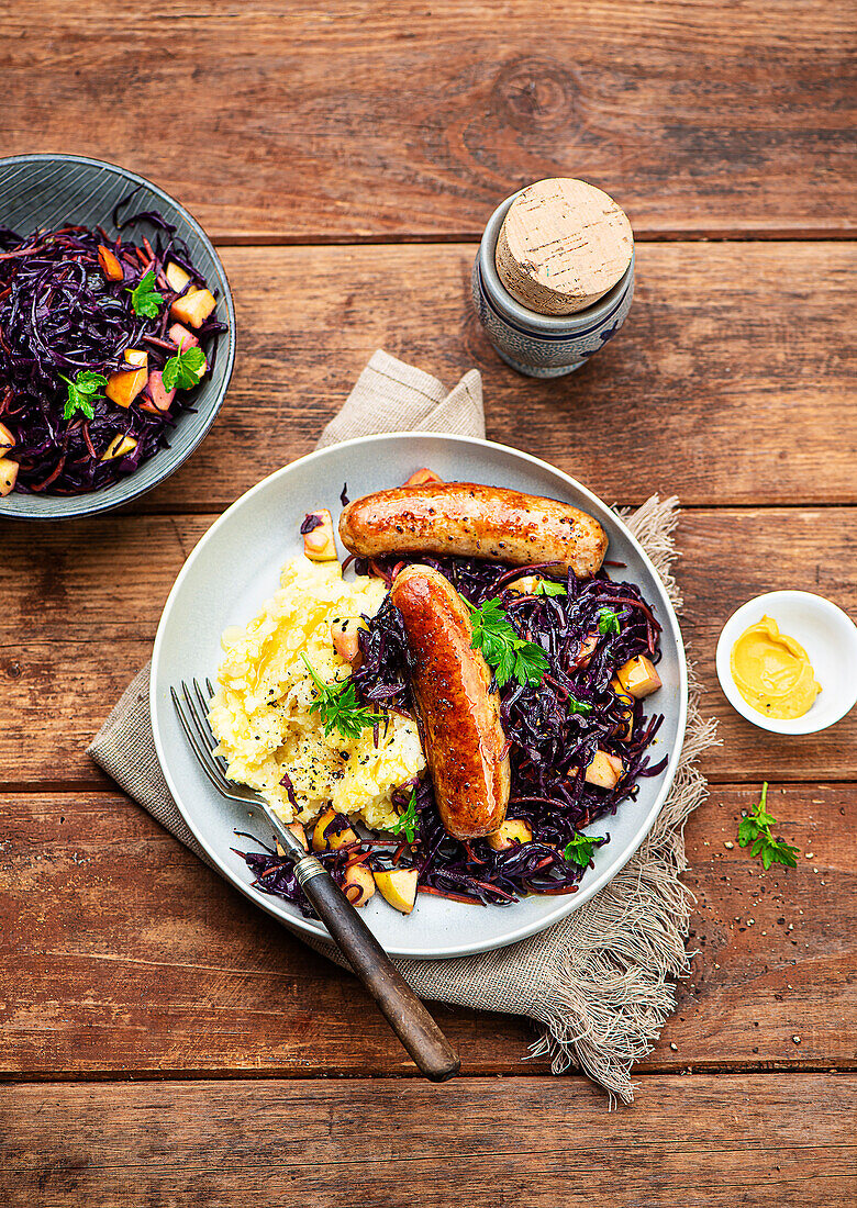 Sausages with red cabbage and mashed potatoes