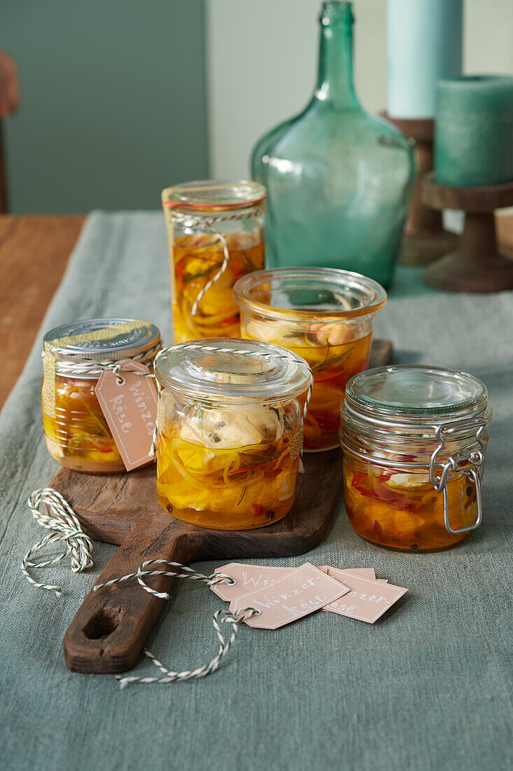 Pickled winegrower's cheese with pepperoni, and rosemary