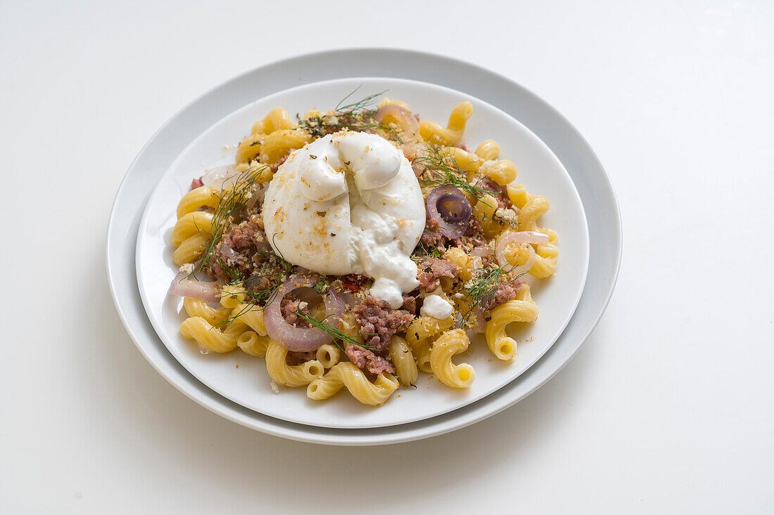 Cavatappi with sausage meat and stracciatella cheese (Italy)