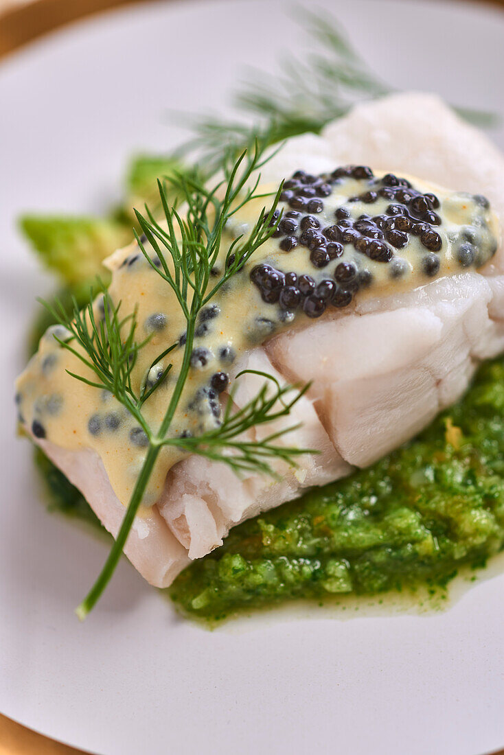 Cod with lumpfish roe on romanesco puree