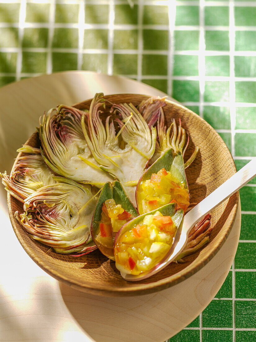 Artichokes with tomatoes and candied lemons