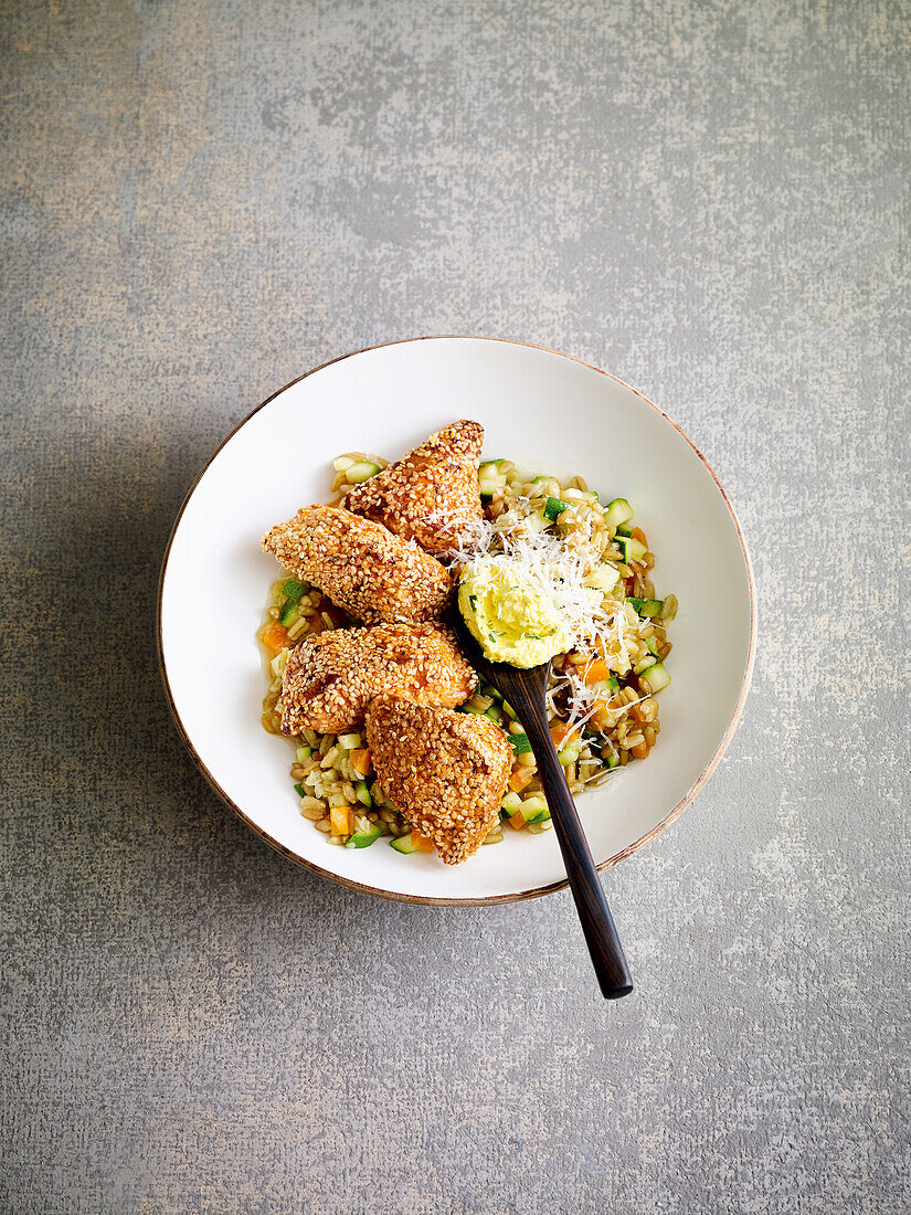 Green spelt risotto with sesame chicken