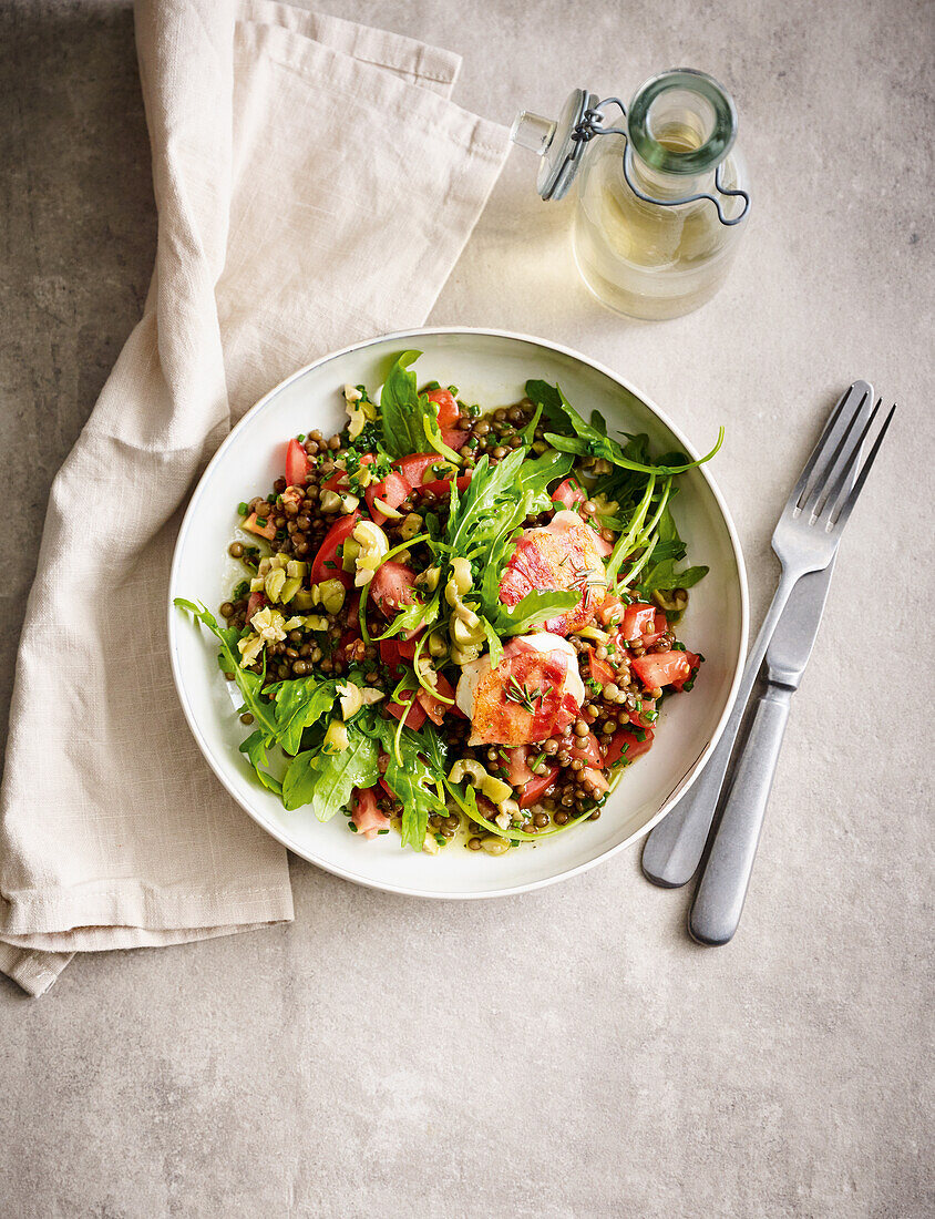 Lentil salad with goat cheese wrapped in bacon