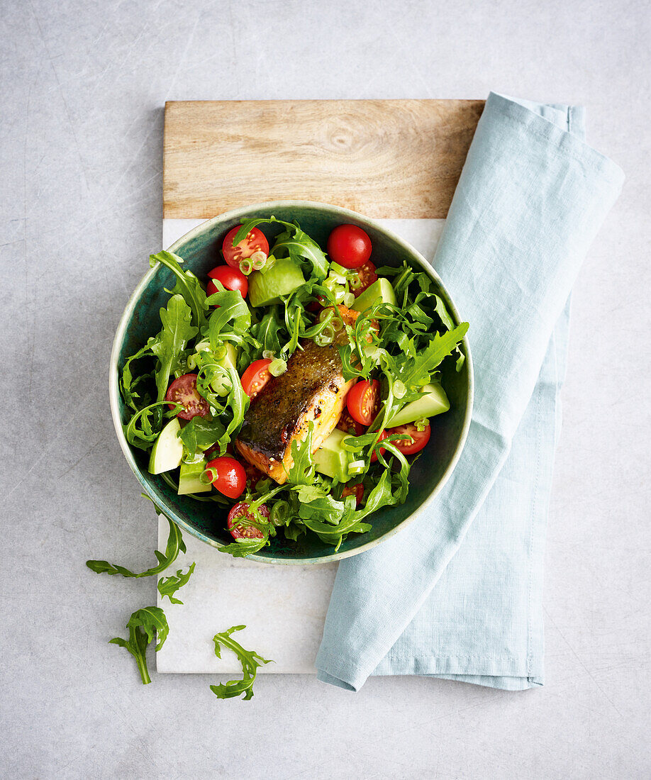 Avocado salad with rocket and salmon