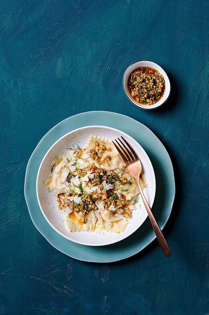 Pumpkin celery ravioli with apple walnut pesto