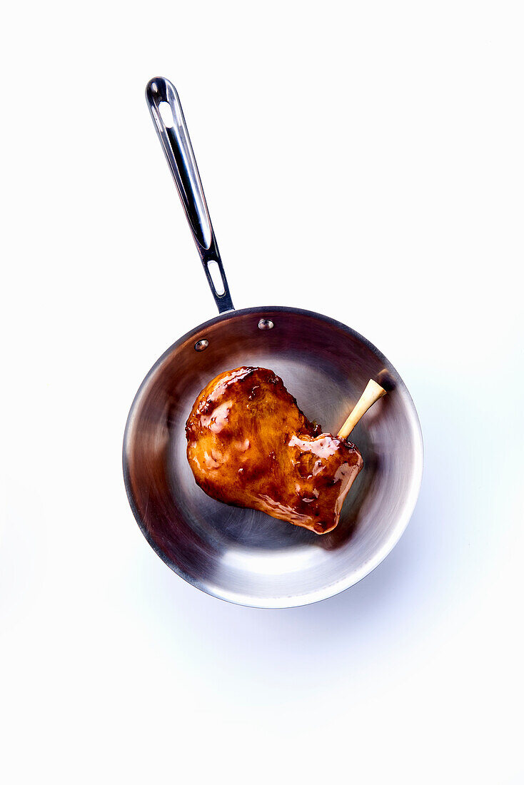 Lamb chops in a frying pan