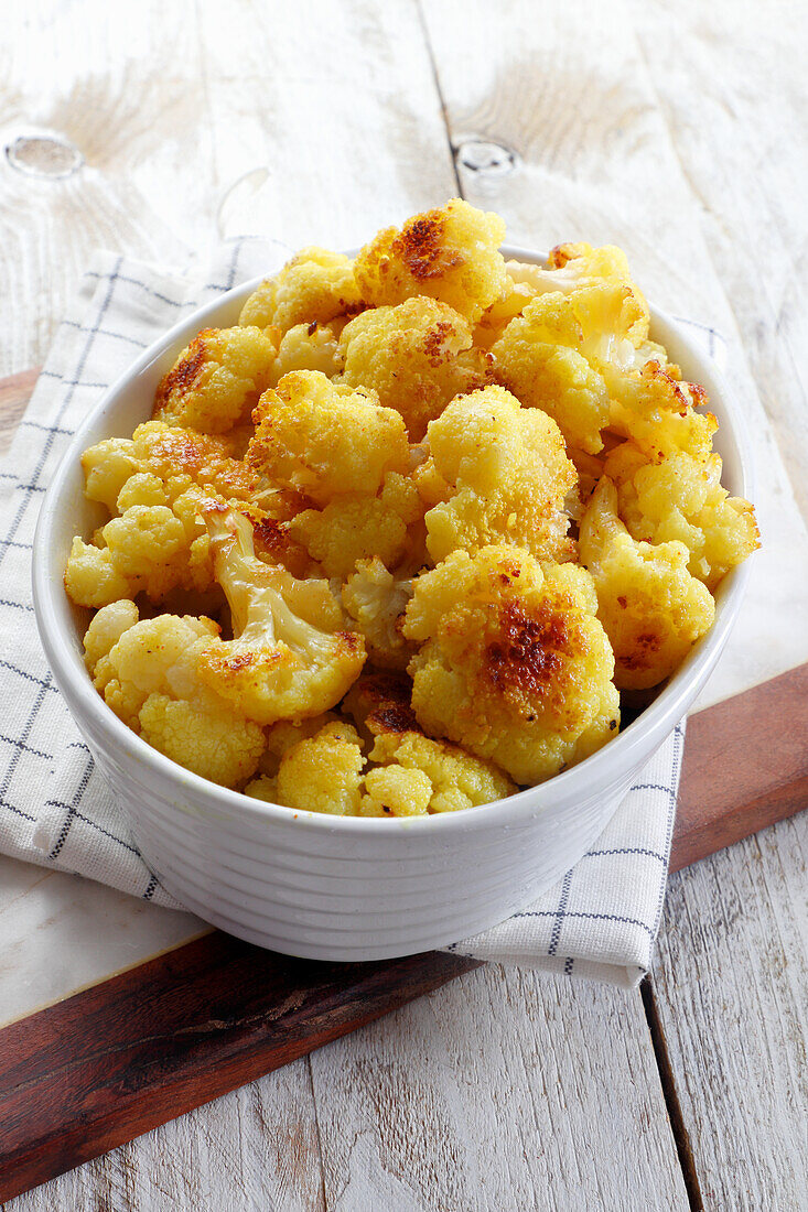 Roasted cauliflower in spices turmeric chili