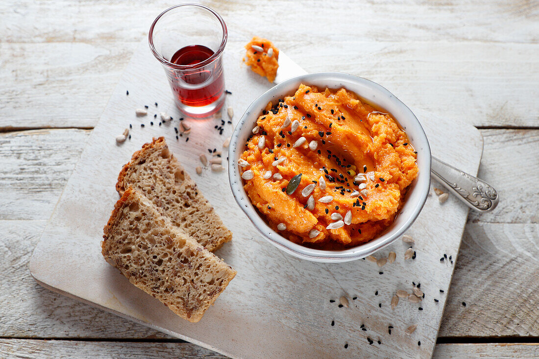 Baked sweet potato paste with black cumin oil, sprinkled with black cumin seeds