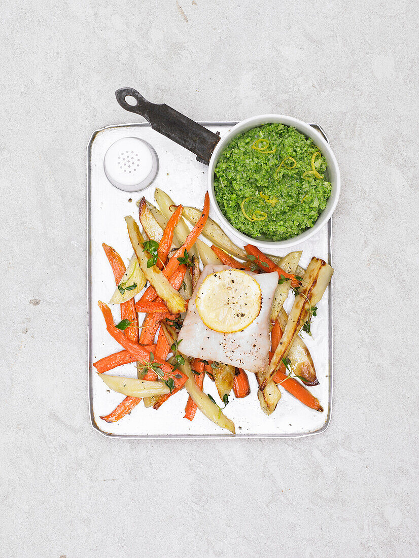 Lemon scented fish and chips with carrots and broccoli puree
