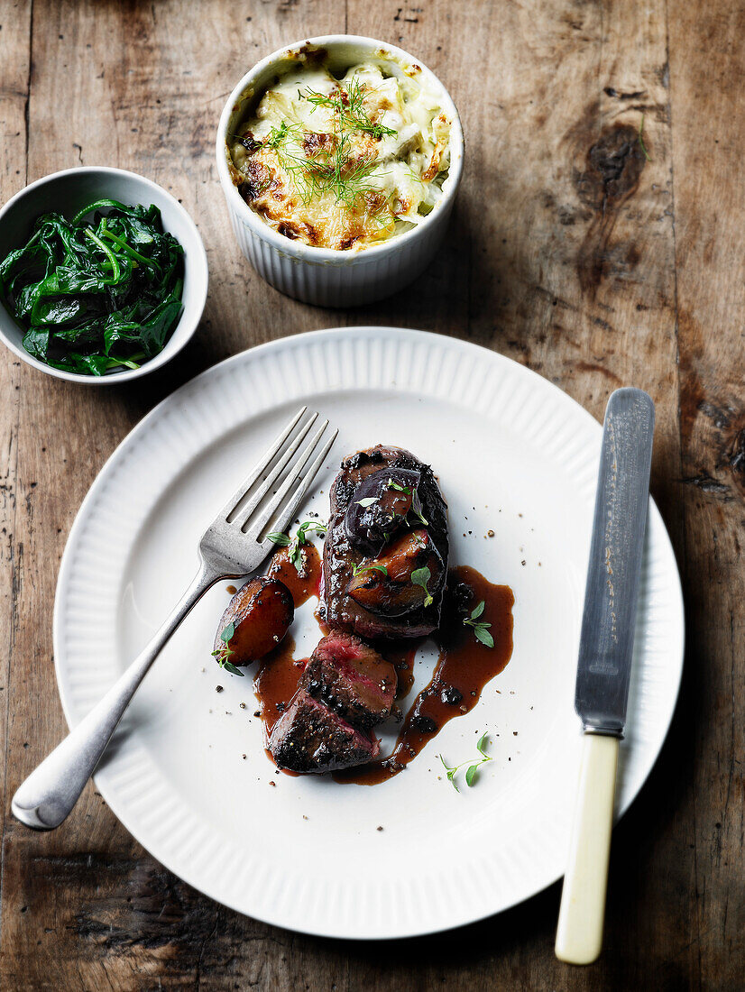 Roasted venison with sloe gin and plum sauce