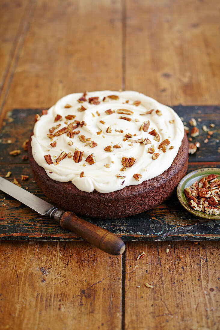 Zucchini pecan cake with maple syrup icing