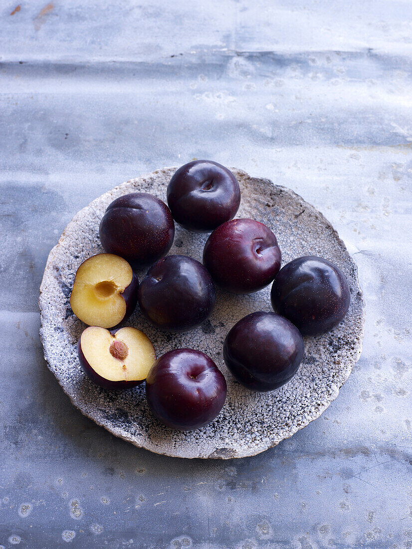 Fresh plums on a plate