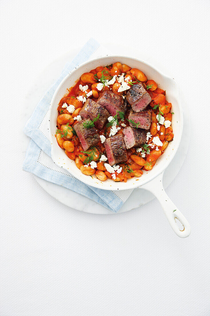 Greek beans with roasted lamb and feta