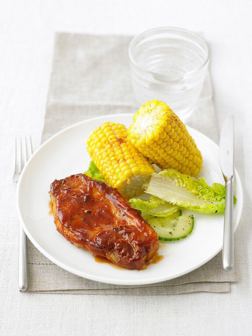 BBQ pork steaks with smoky corn on the cob