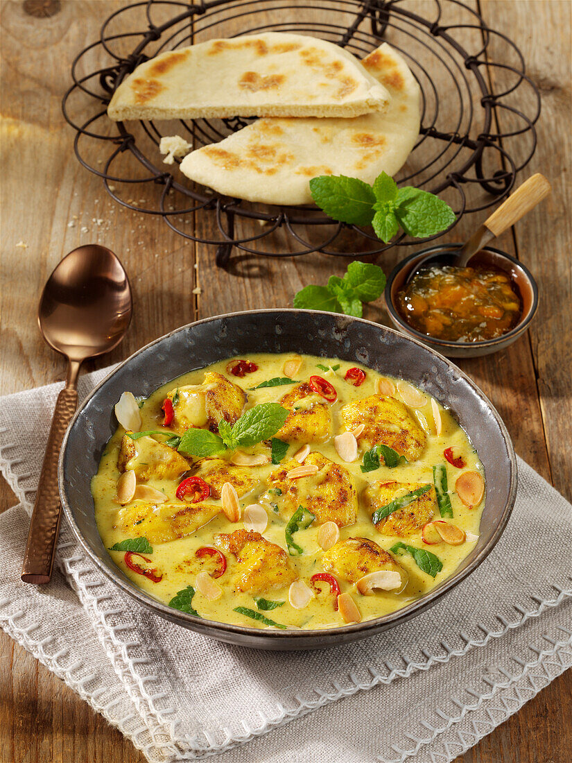 Chicken curry pot with coconut milk and mango chutney