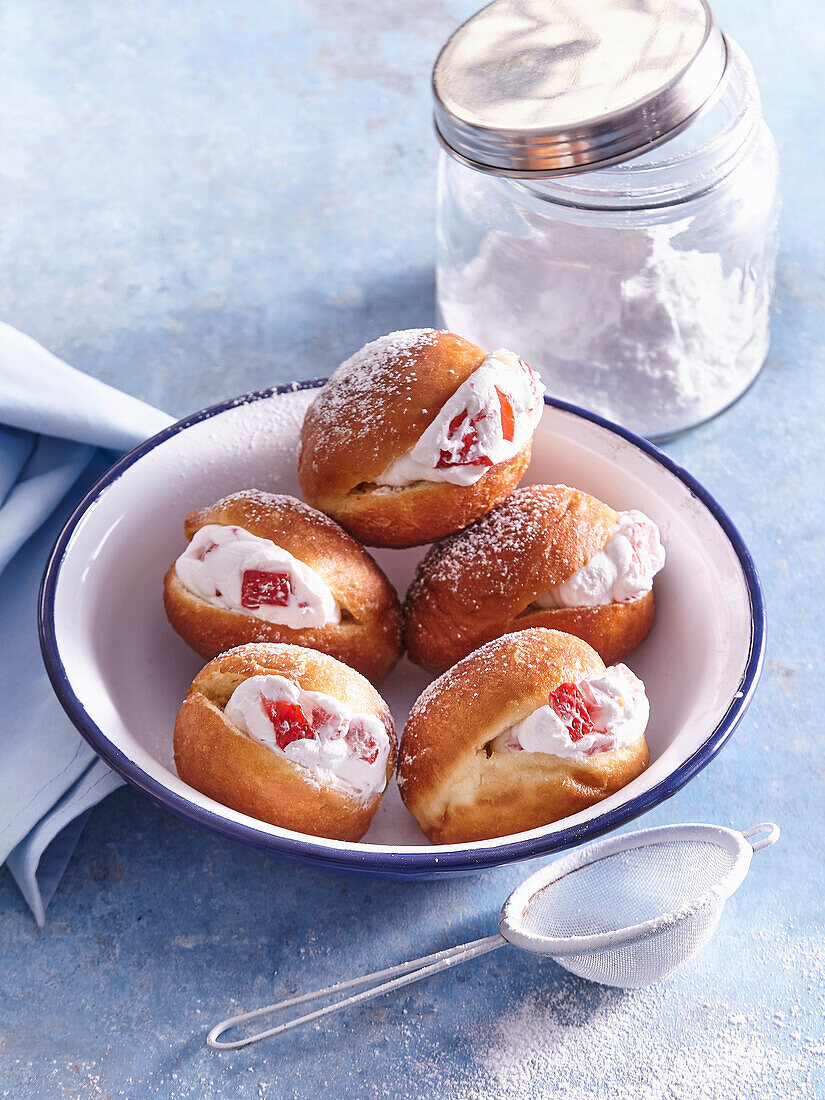 Strawberry and cream filled doughnuts