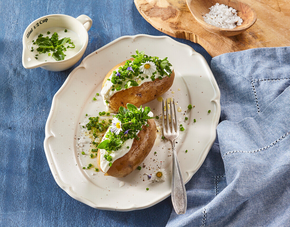 Stuffed baked potatoes with herbs and sour cream