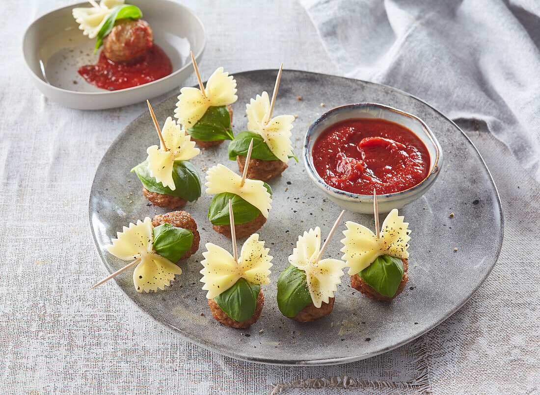 Italian meatball pasta bites with tomato dip