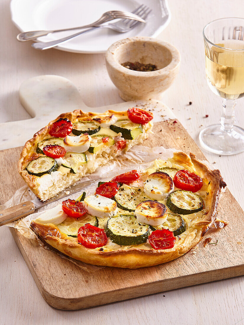 Quiche with zucchini, tomatoes, and goat cheese