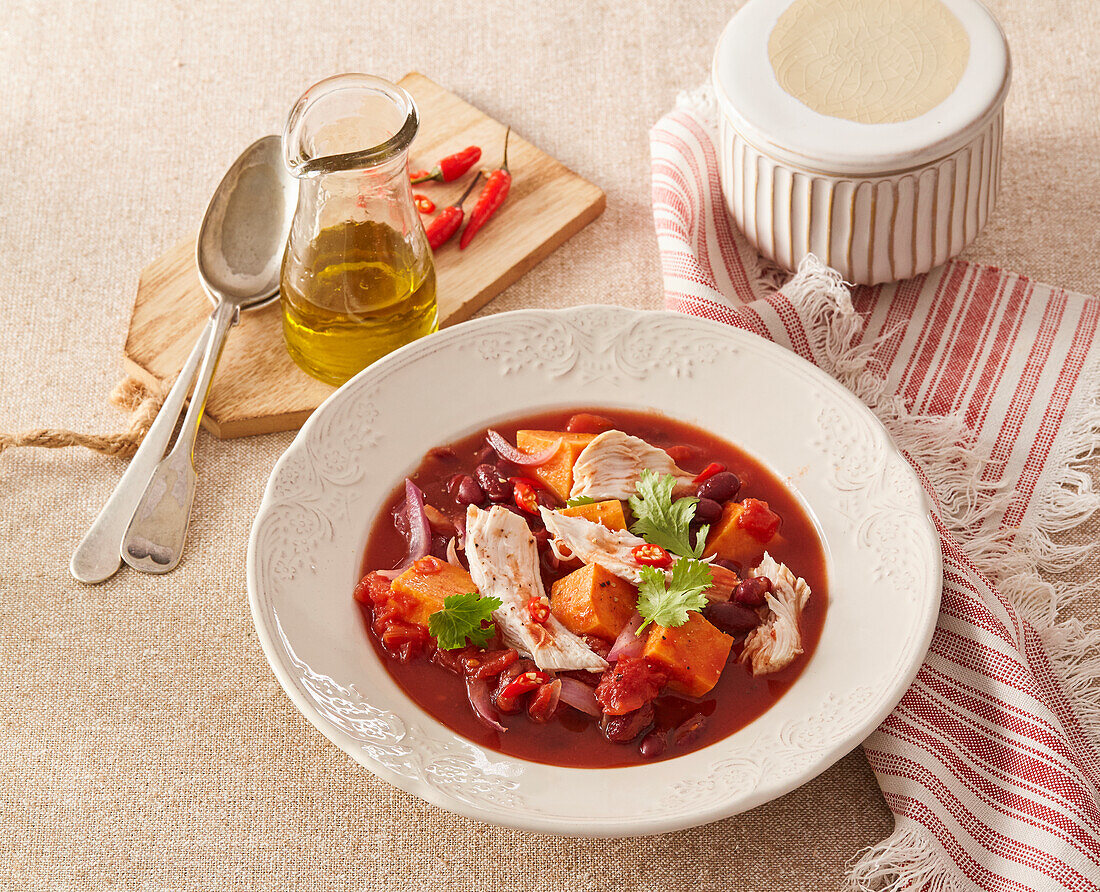 Red chicken and vegetable stew