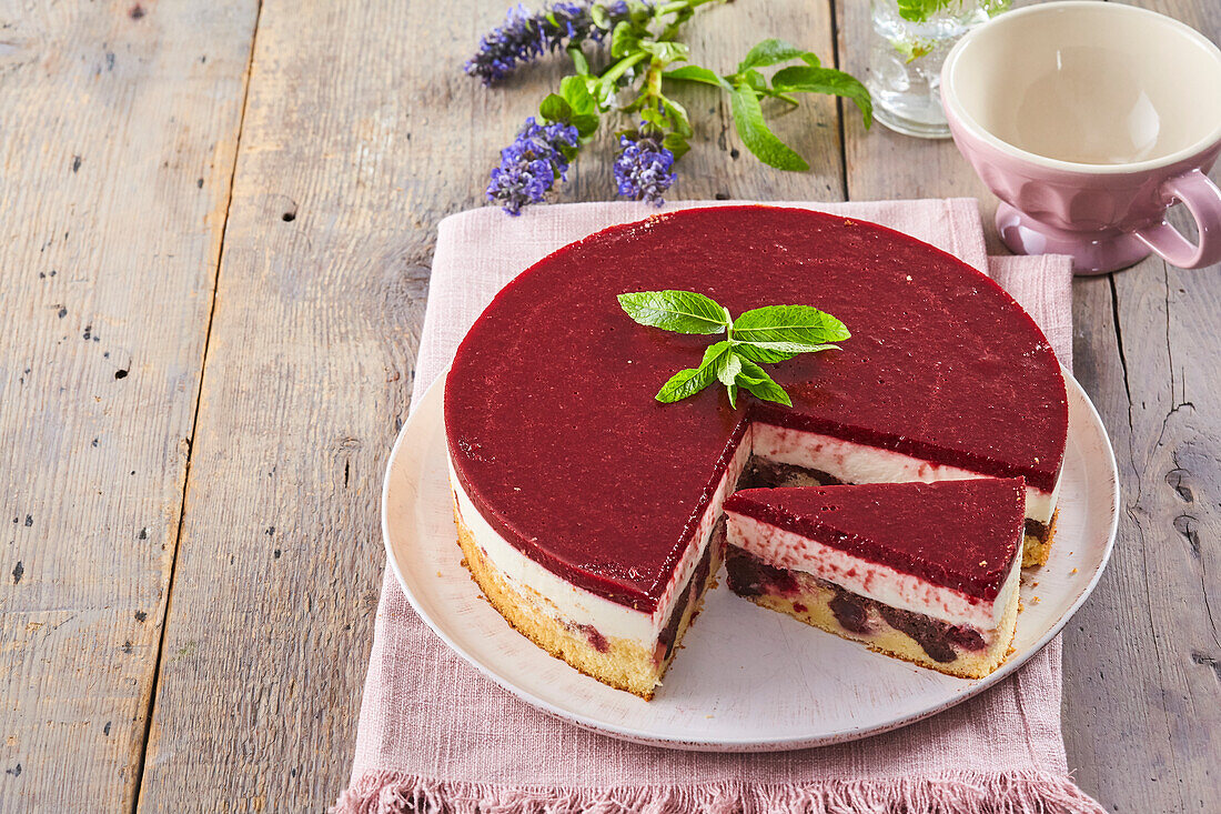 Creamy cake with sour cherry jelly