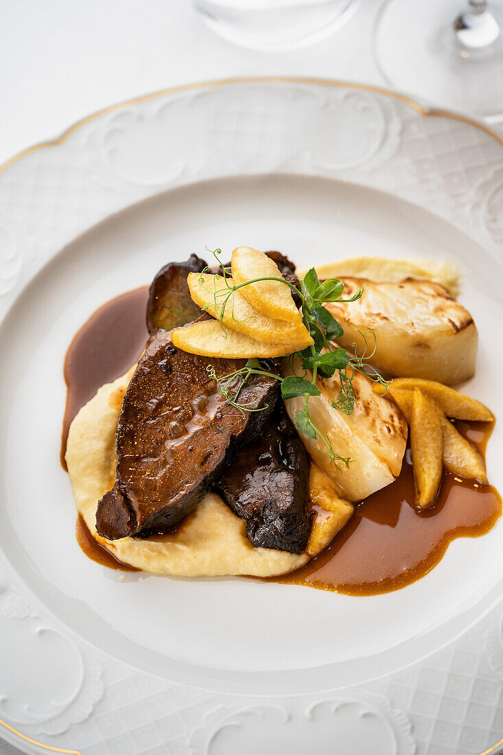 Roasted venison with celeriac and mashed potatoes