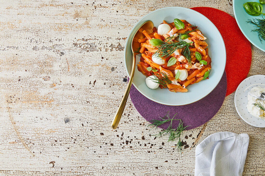 Pasta with Tomato Sauce, Fresh Mini Mozzarella Balls and Fresh Herbs