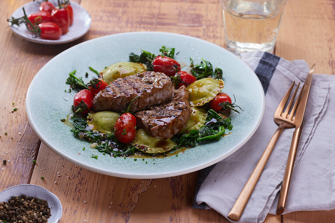 Fillet of beef with ravioli and vegetables