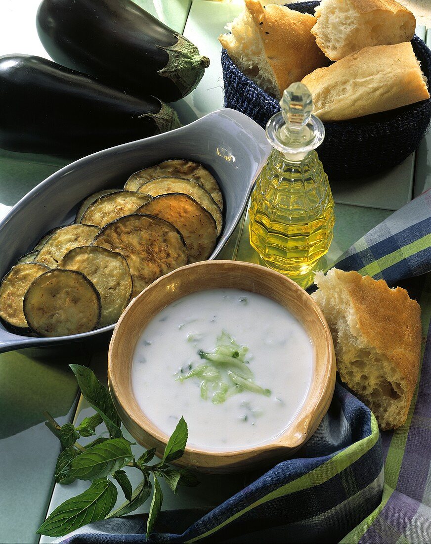 Tzaziki, fried aubergine slices, flat bread & olive oil
