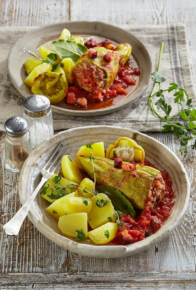 Stuffed peppers with potatoes and tomato sauce