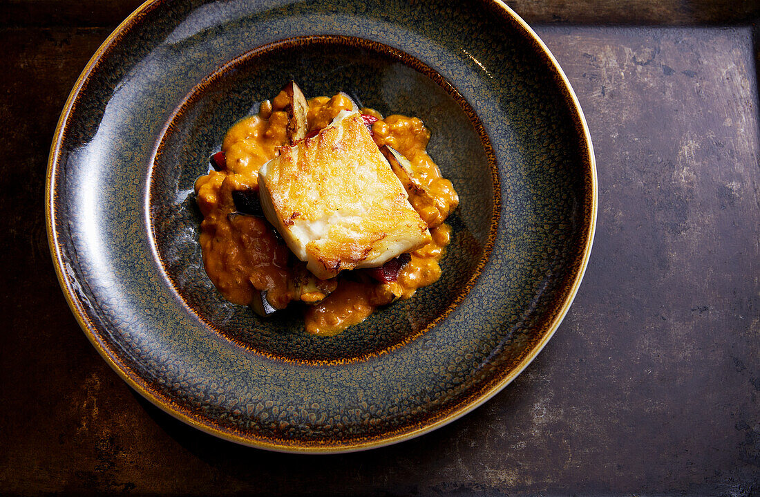 Coconut curry with fried fish