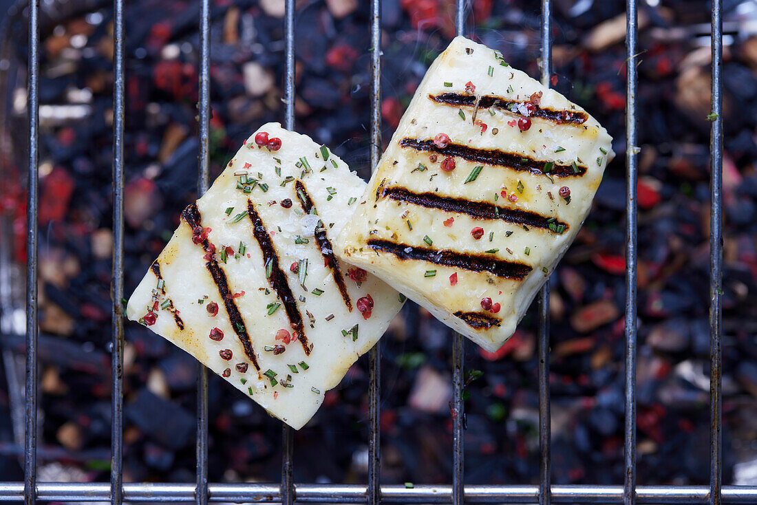 Grilled halloumi on a grill grate