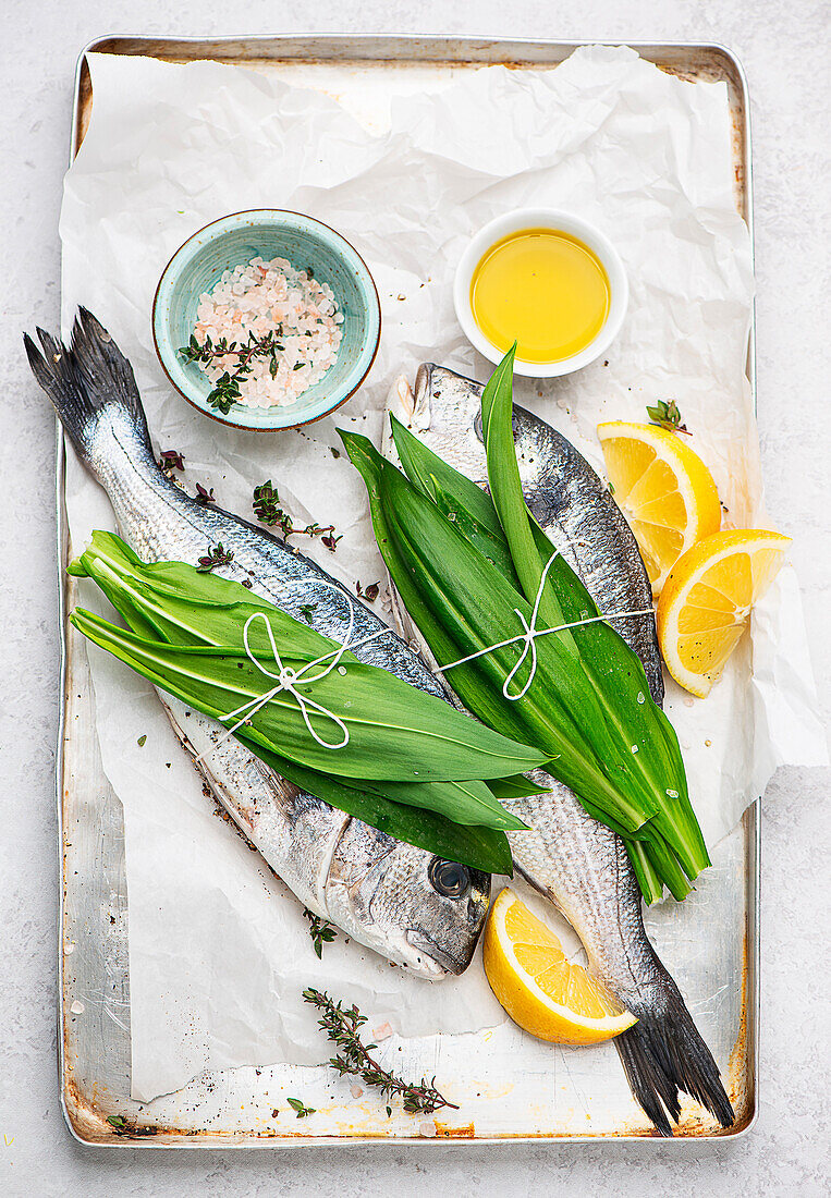 Grilled whole gilthead with wild garlic