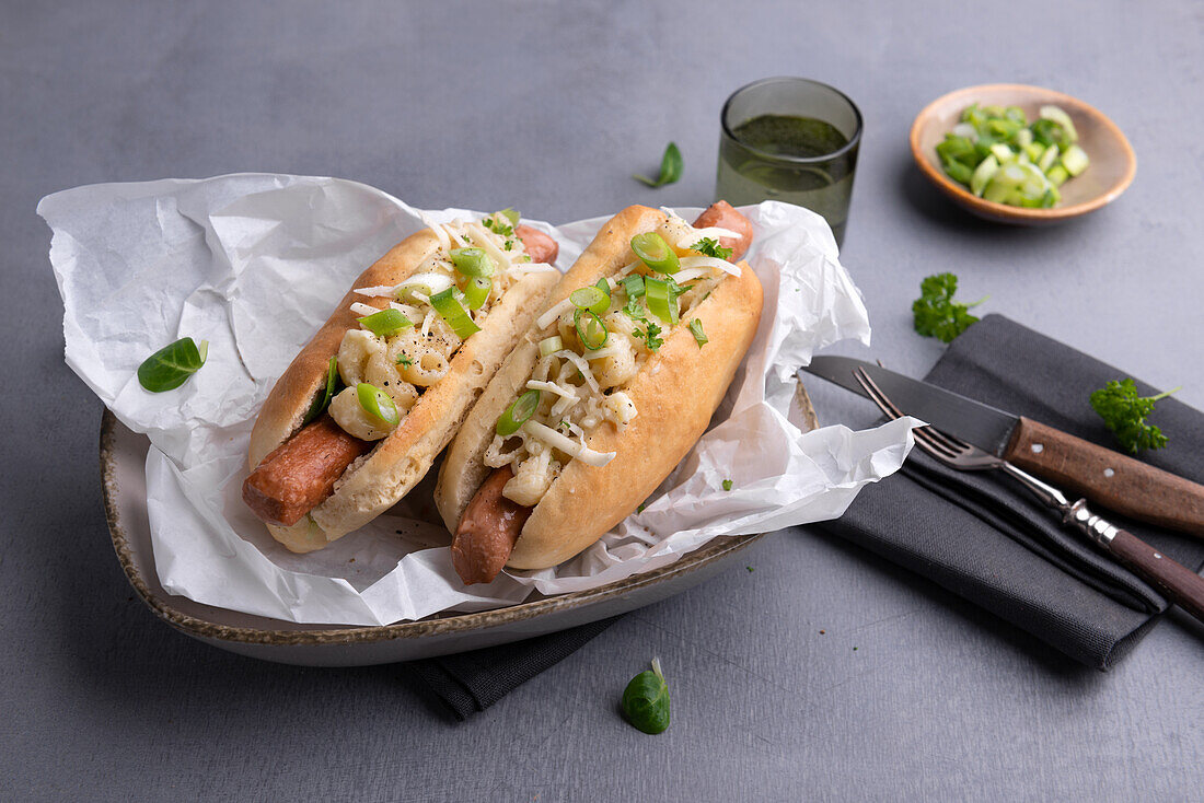 Vegan hot dogs with soy sausages and mac and 'cheese’