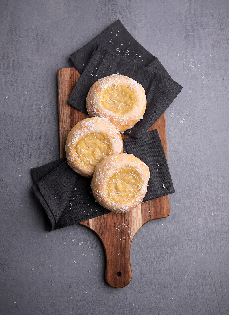 Skolebrød - yeast pastry with custard cream and coconut flakes