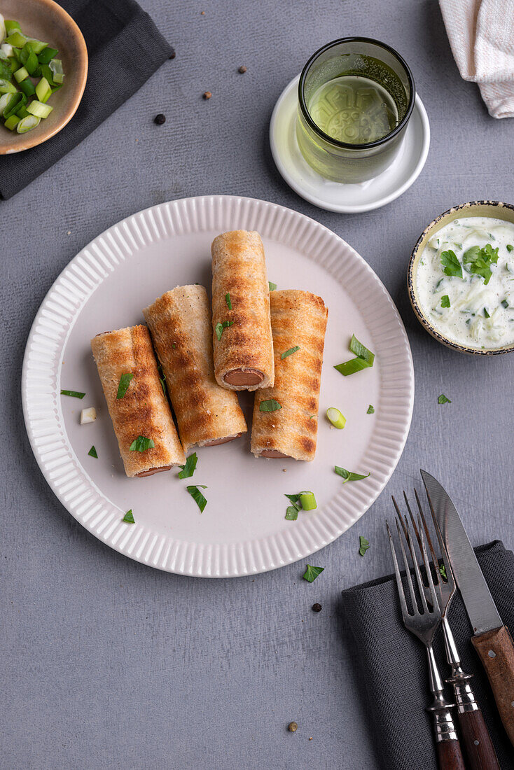 Vegan sausages wrapped in bread dough