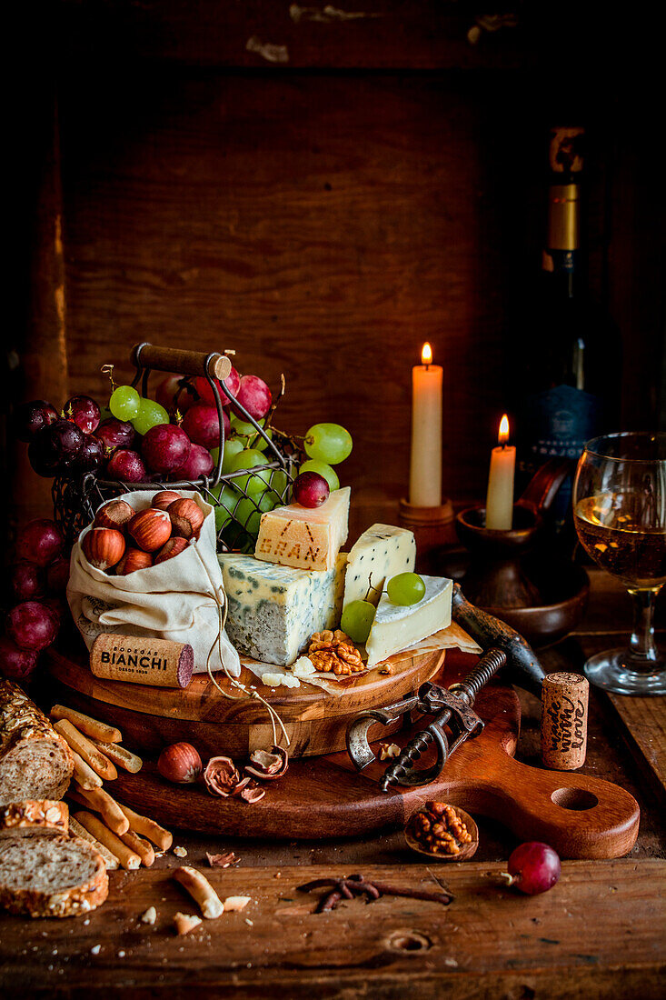 Cheese board with grapes and nuts