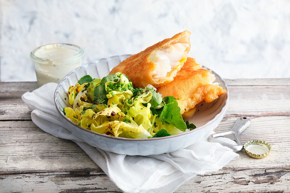 Perch in beer batter served with a mixed leaf salad