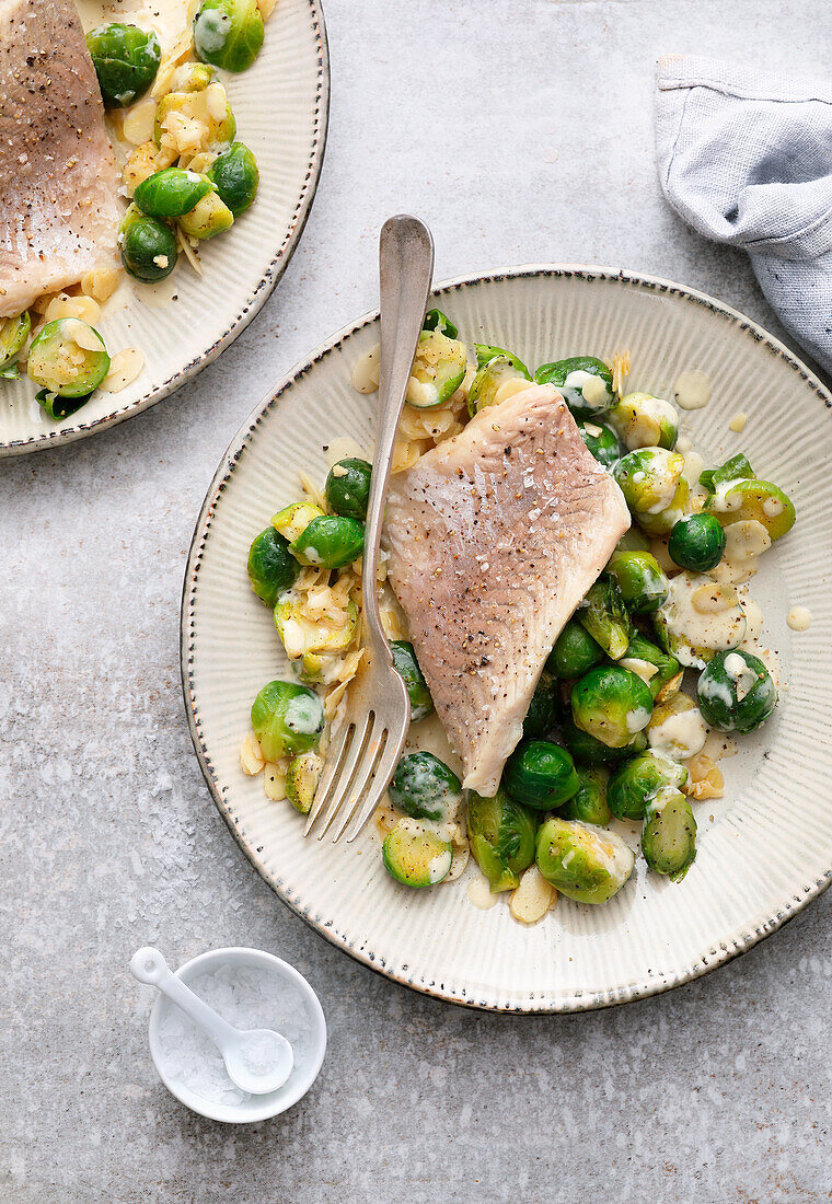 Poached carp with Brussels sprouts