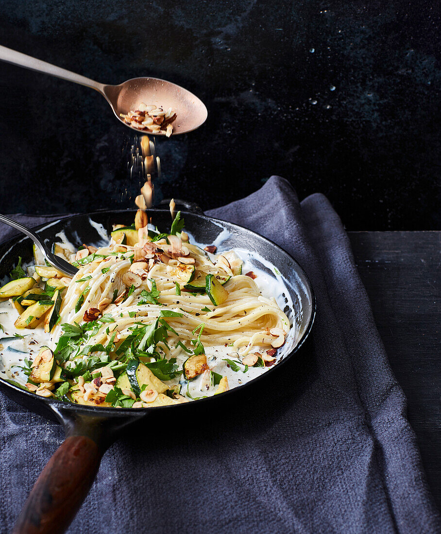 Courgette noodles with hazelnuts and goat’s cheese cream