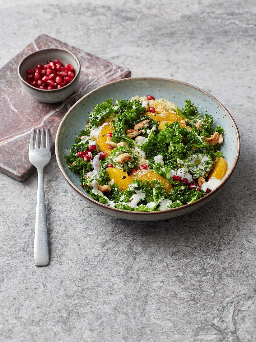 Kale and orange bowl with couscous