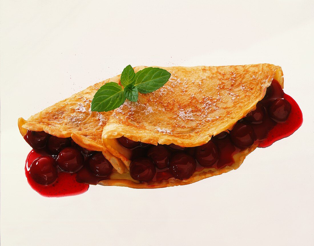 Pancake with cherry compote