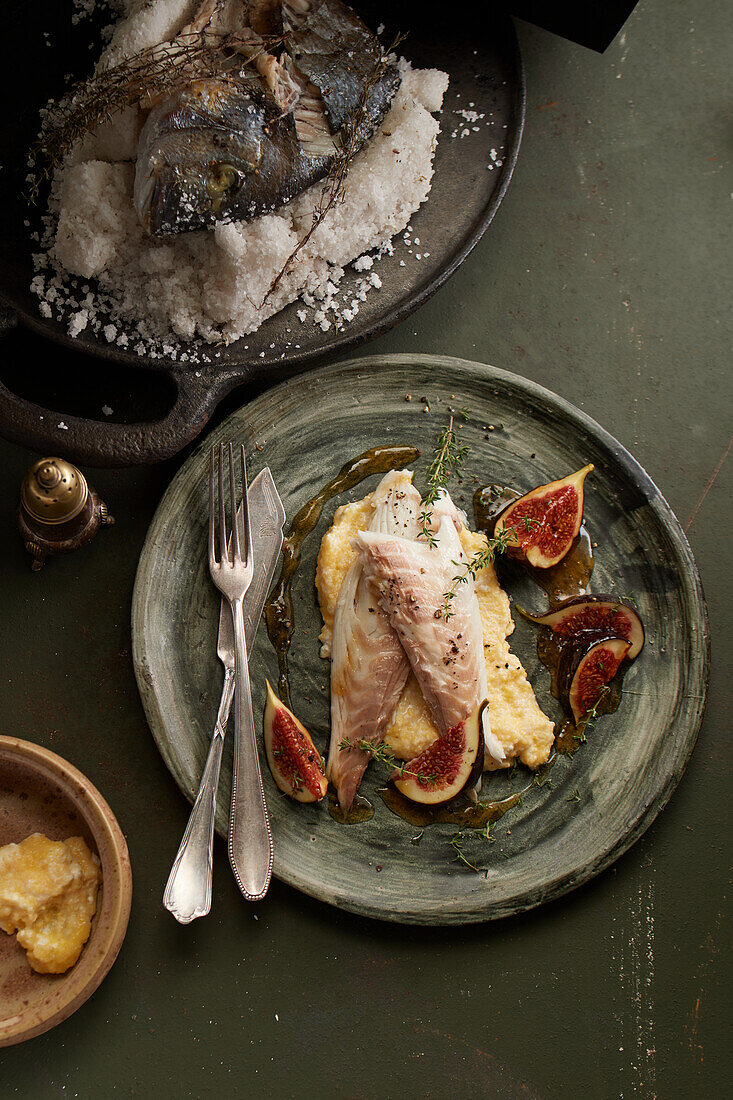 Dorade cooked in thyme salt dough served with figs