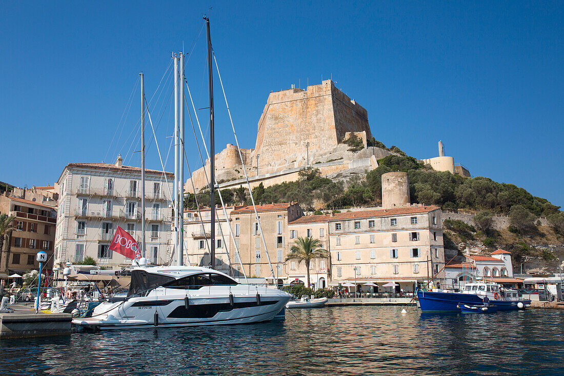 View across harbour to the historic citadel, the Bastion de l'Etendard prominent, Bonifacio, Corse-du-Sud, Corsica, France, Mediterranean, Europe