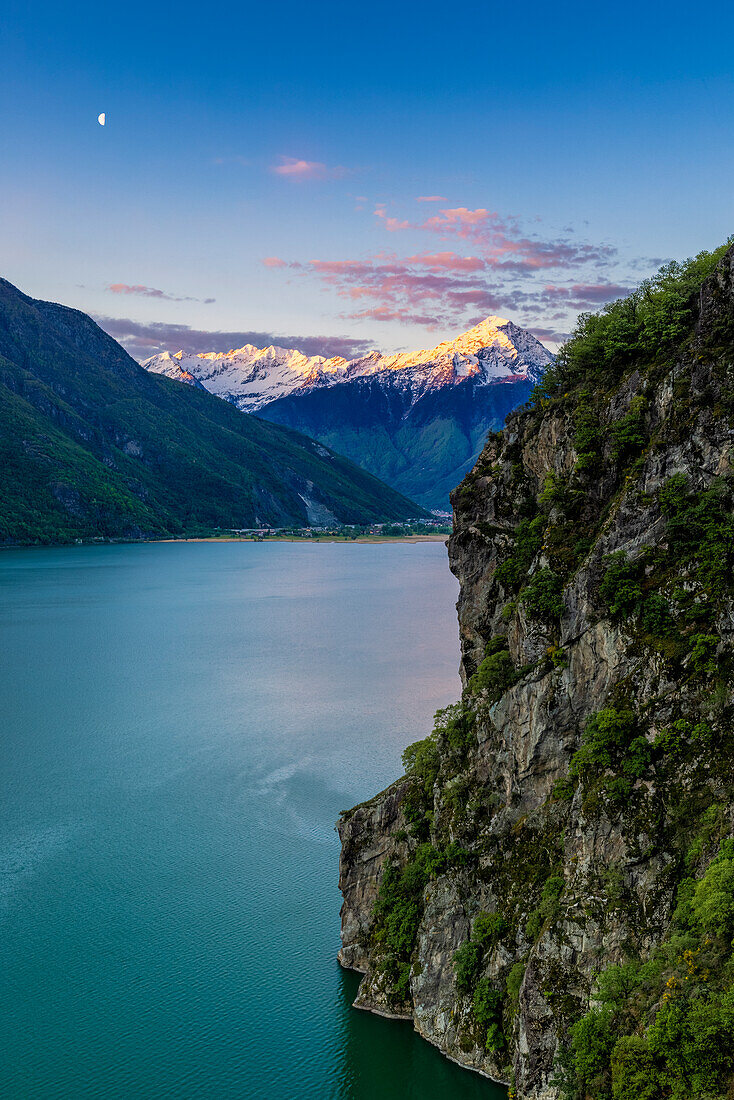 Monte Legnone at sunrise from elevated viewpoint above Lago di Novate, Valchiavenna, Valtellina, Lombardy, Italy, Europe