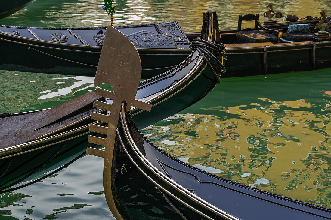 View of empty gondolas with the distinctive iron prow head, Venice, Veneto, Italy, Europe